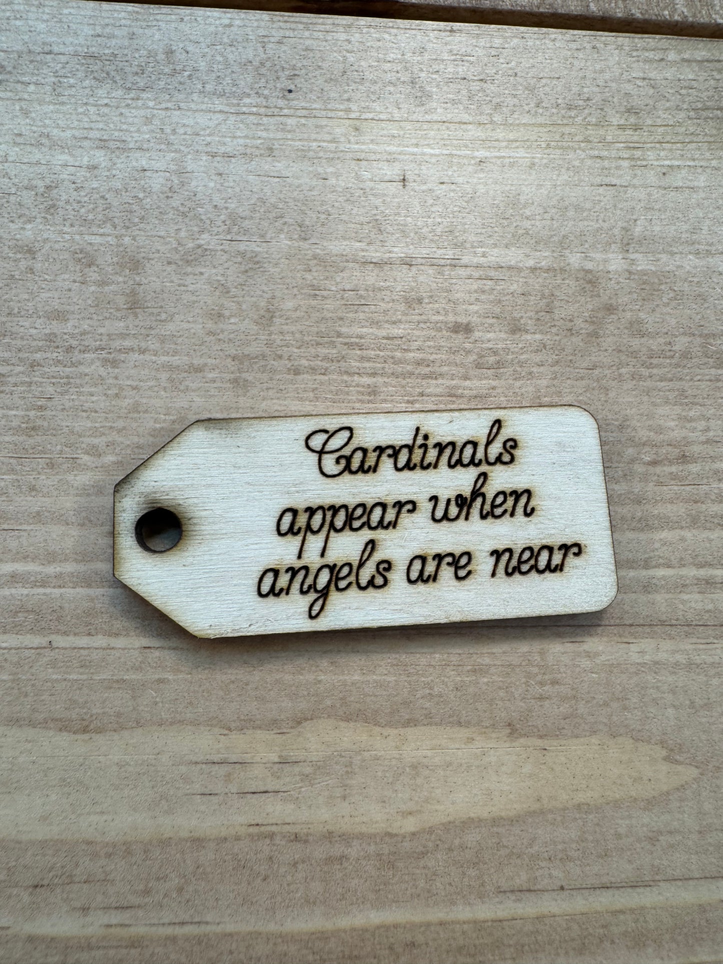 Cardinals appear wooden tag