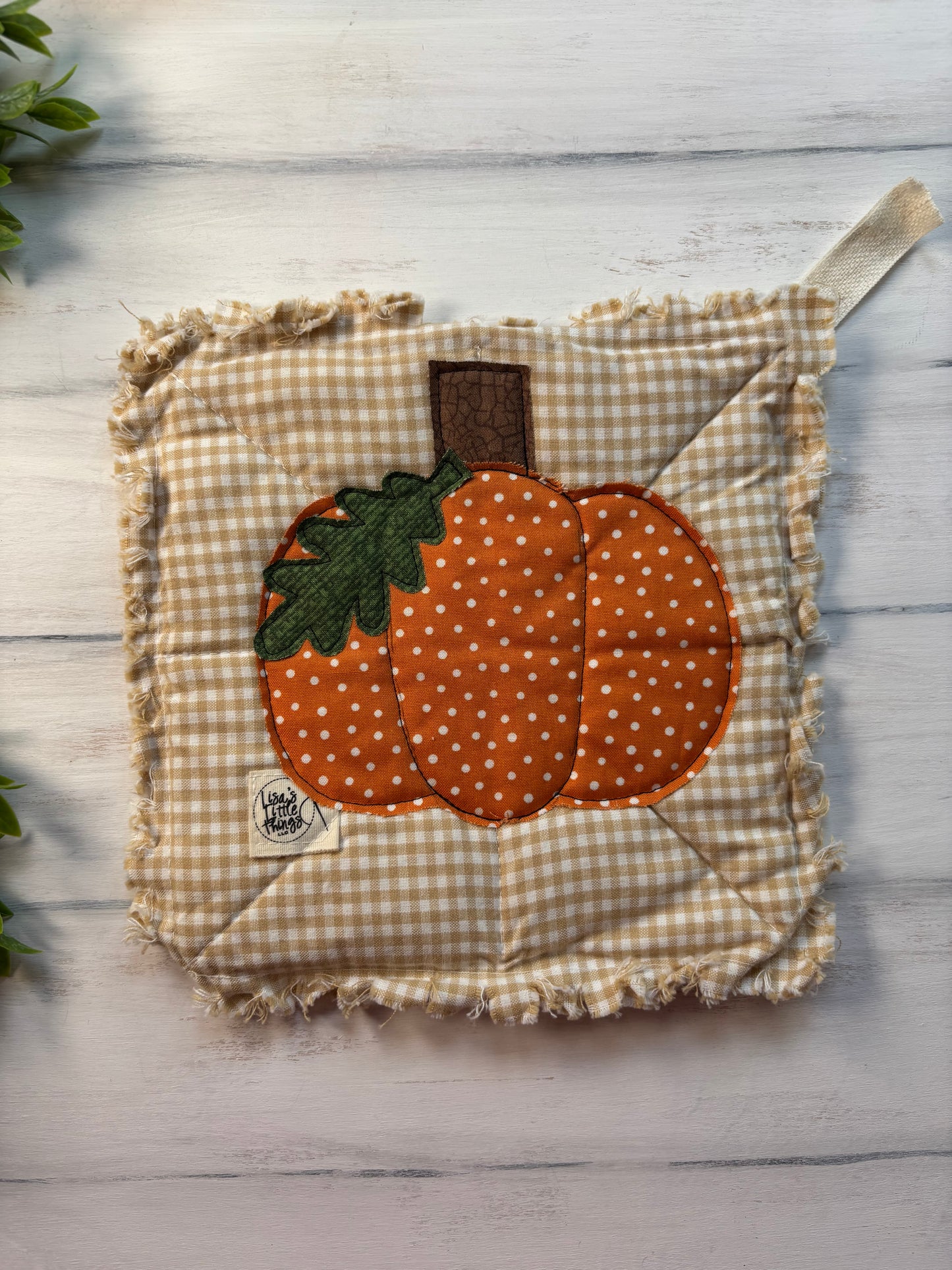 Pumpkin stitched potholder