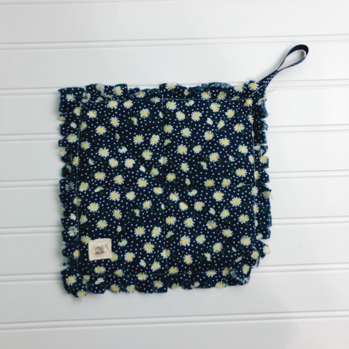 Navy with daisies potholder