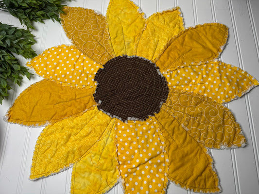 Sunflower rag quilted table piece with brown center