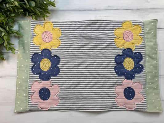 Spring flowers 12” X 19” quilted table mat