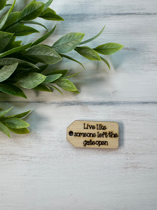 Live like someone left the gate open wooden tag