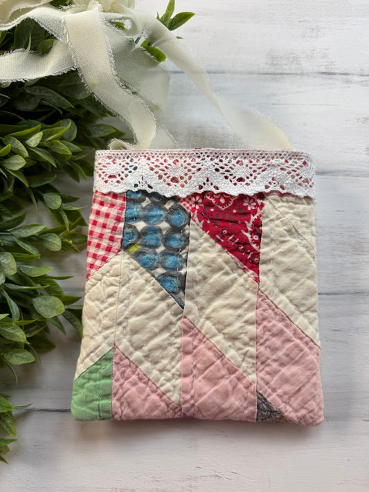 Hanging vintage quilt pocket- your pocket could vary depending on placement on the quilt!