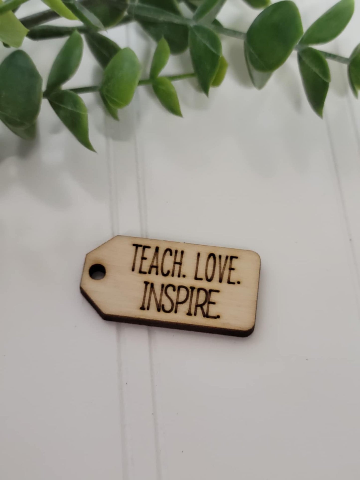 Teach. Love. Inspire. wooden tag