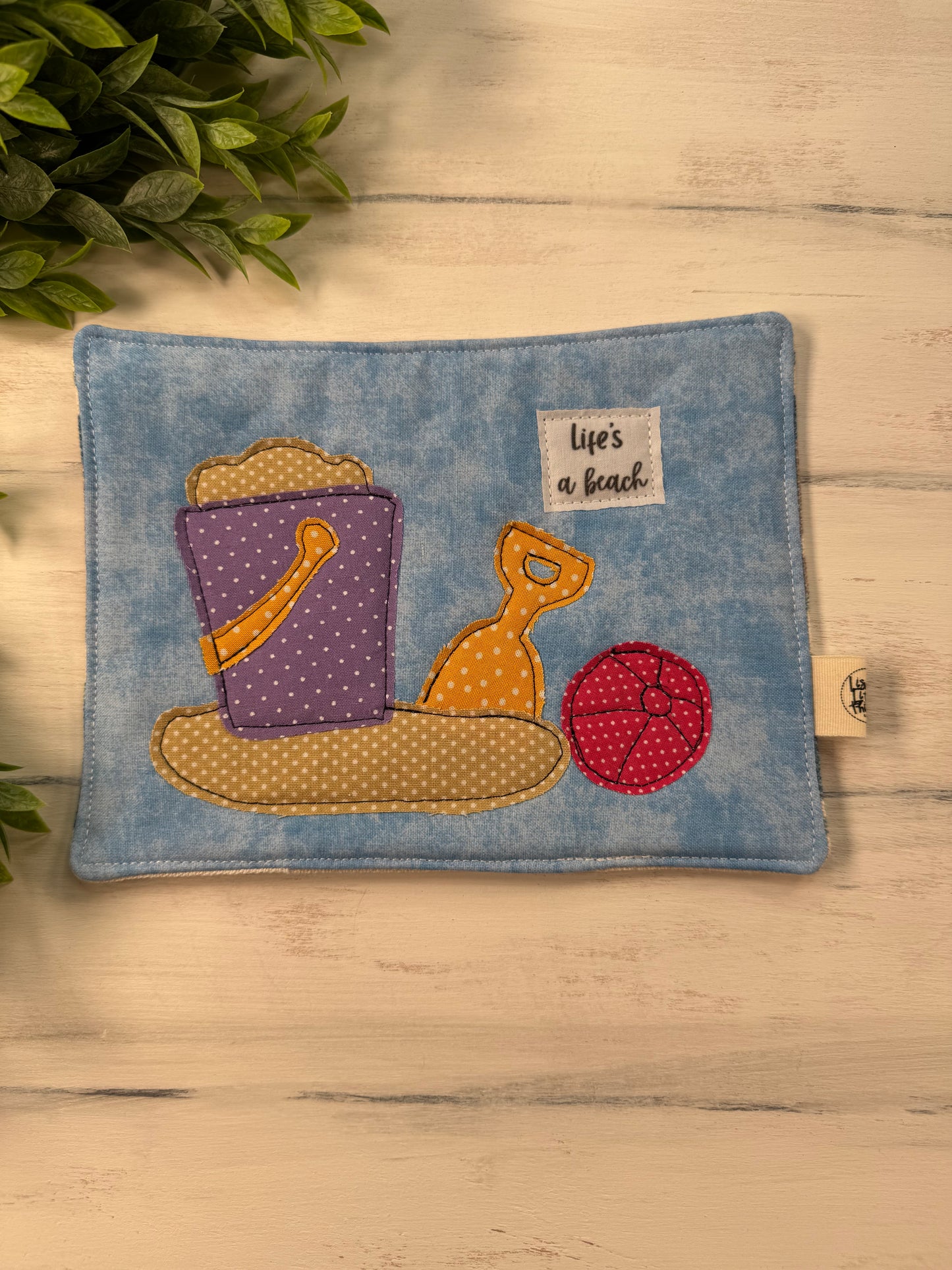 Life’s a beach mug rug