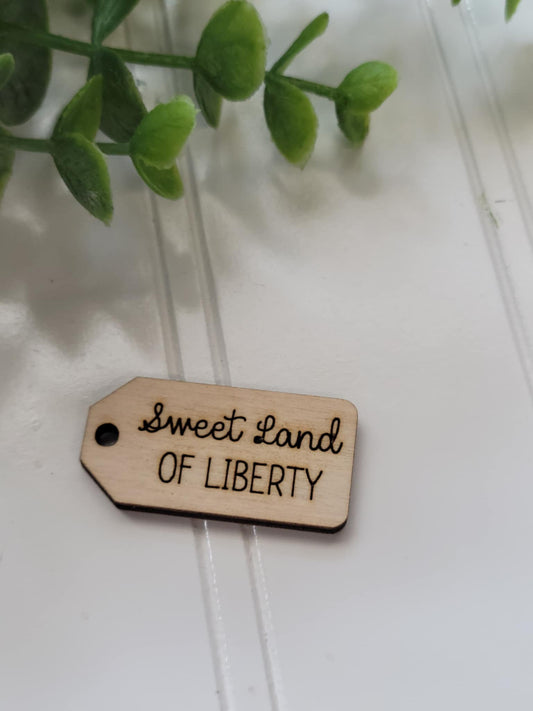 Sweet land of liberty wooden tag