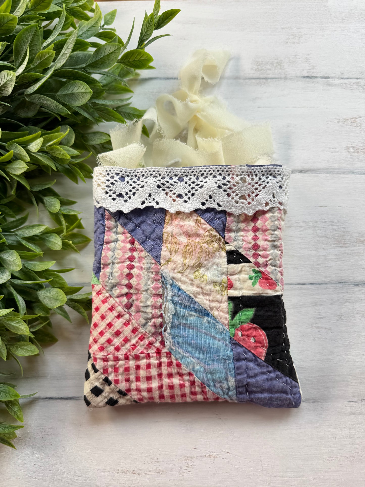 Hanging vintage quilt pocket- your pocket could vary depending on placement on the quilt!