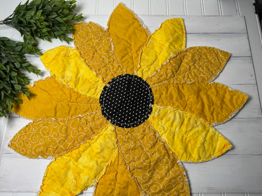 Sunflower rag quilted table piece with black center