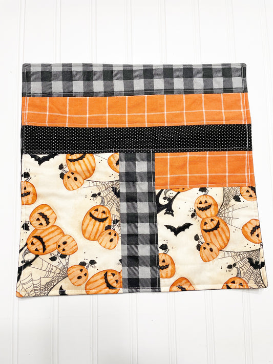 12” quilted scrappy Halloween table mat