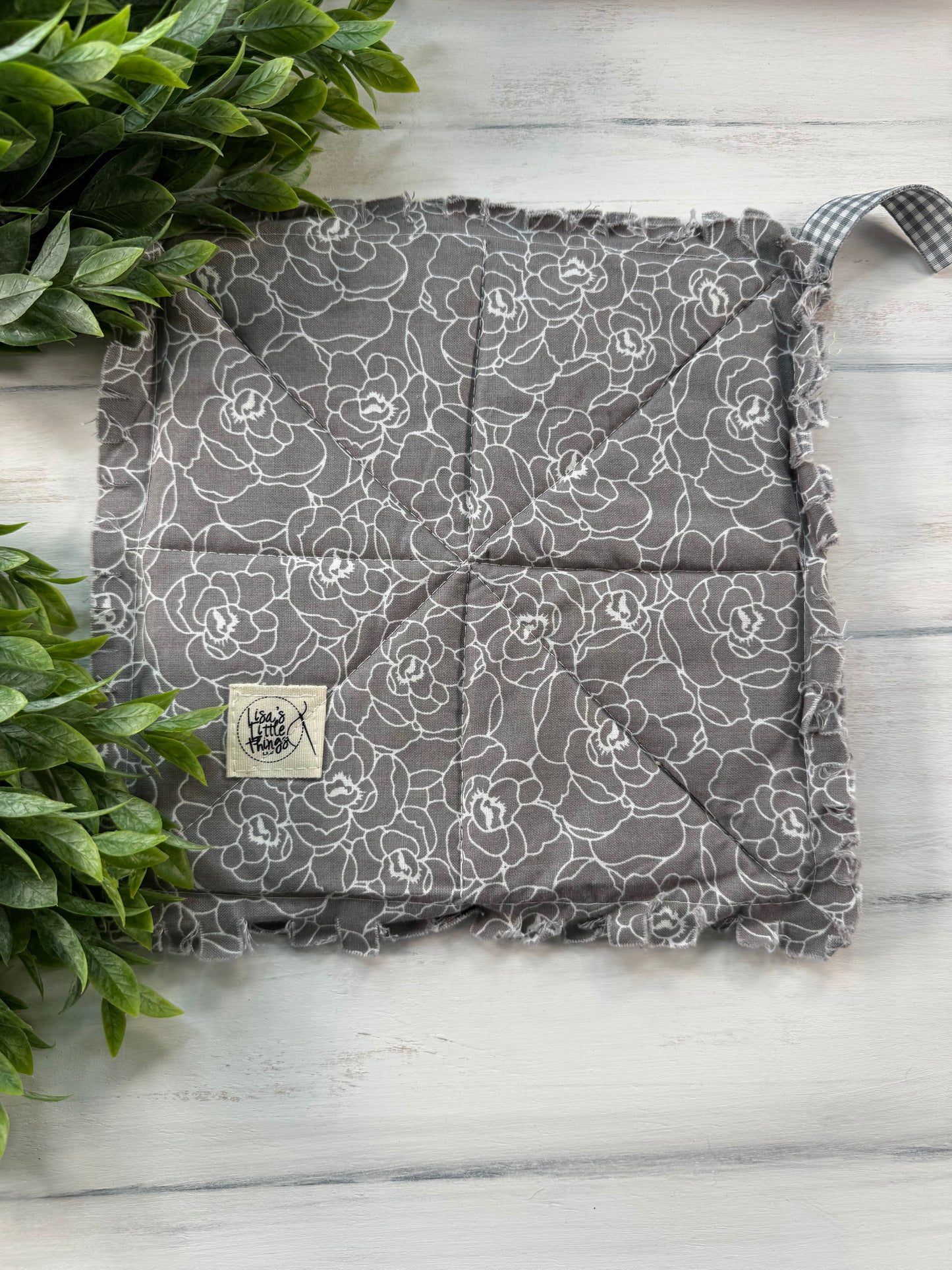 Gray floral print potholder
