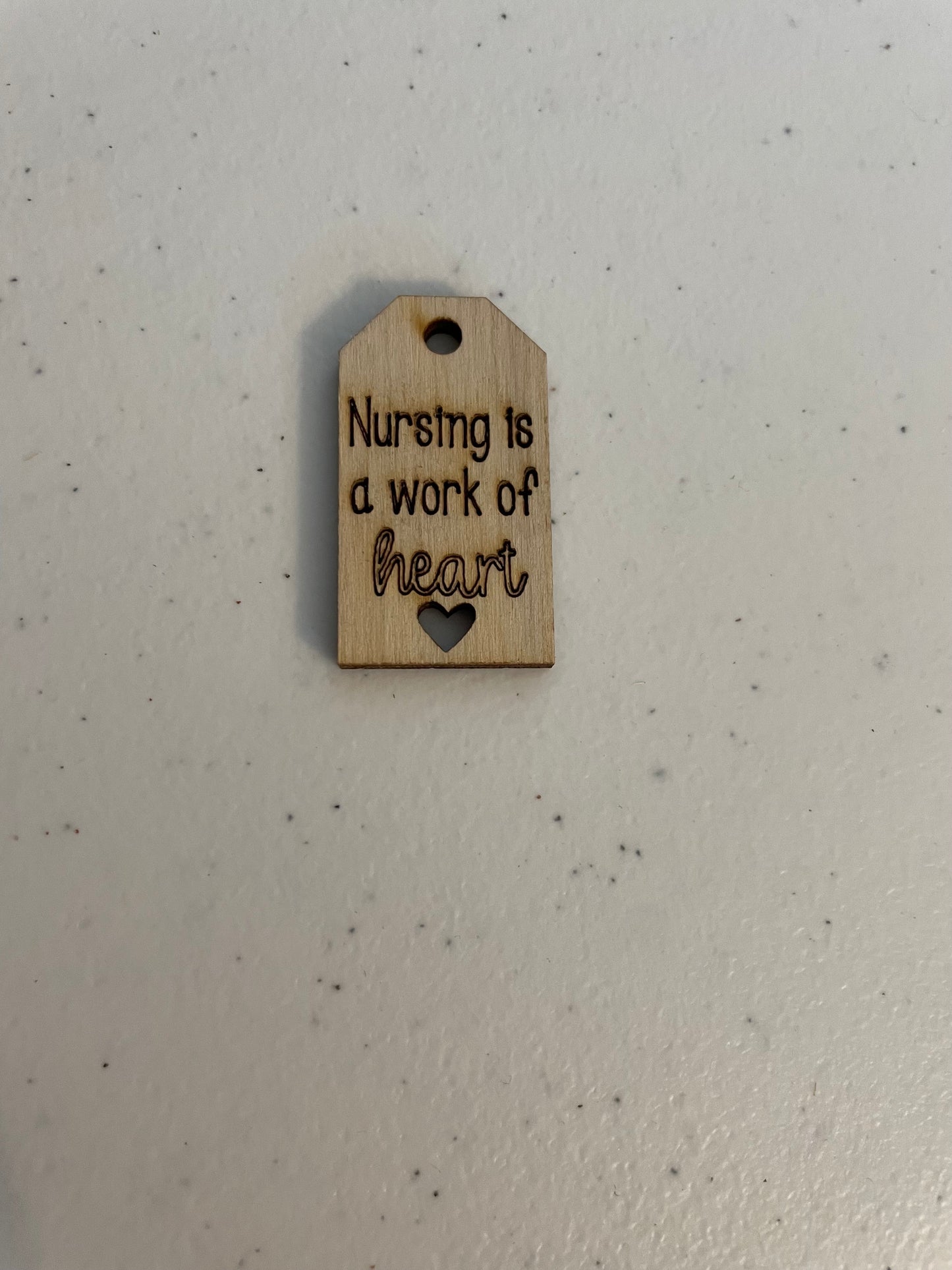 Nursing is a work of heart wooden tag