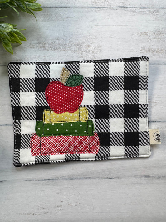 Apple on book stack mug rug