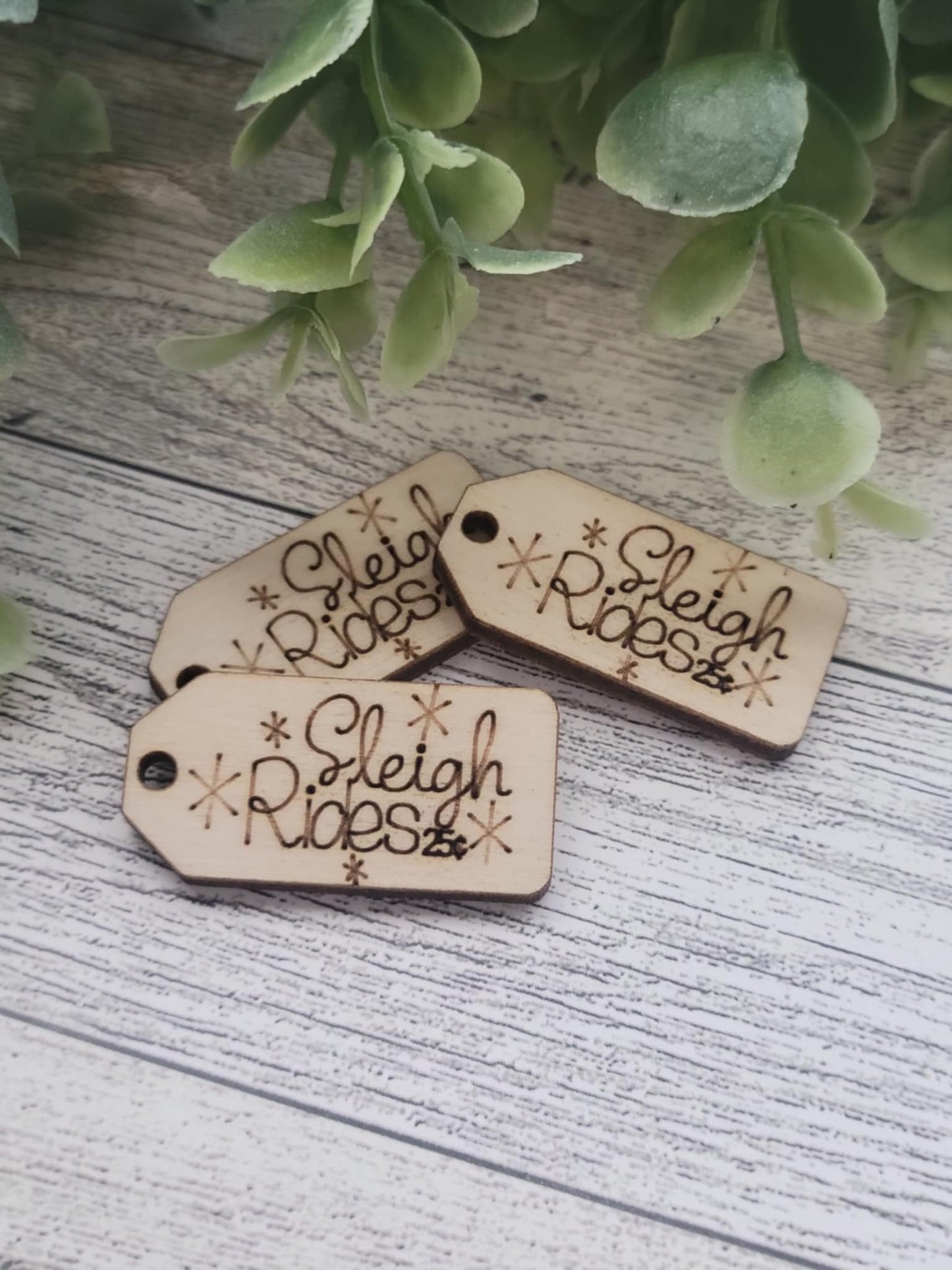 Sleigh Rides 25¢ wooden tag