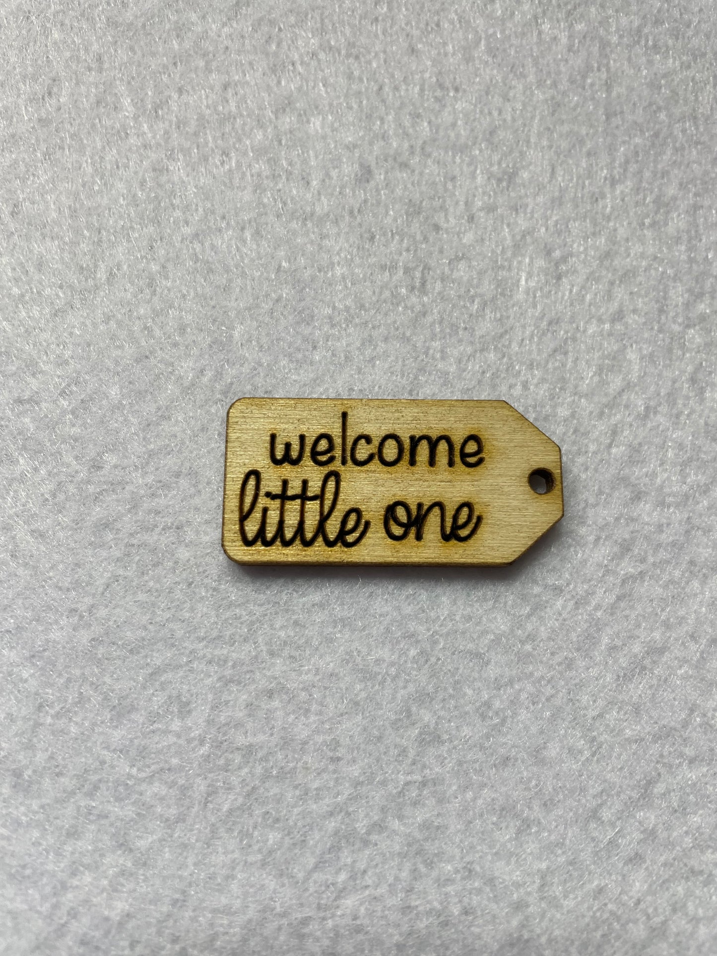 Welcome little one wooden tag